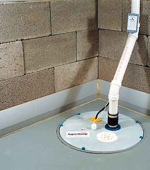 A baseboard basement drain pipe system installed in Canmore